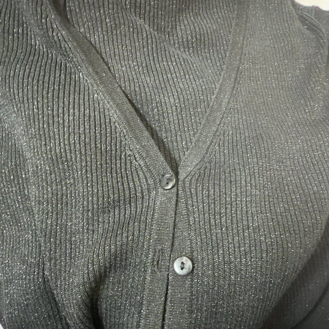Tag view of charcoal silk lurex cardigan showing cropped silhouette and ribbed cuffs