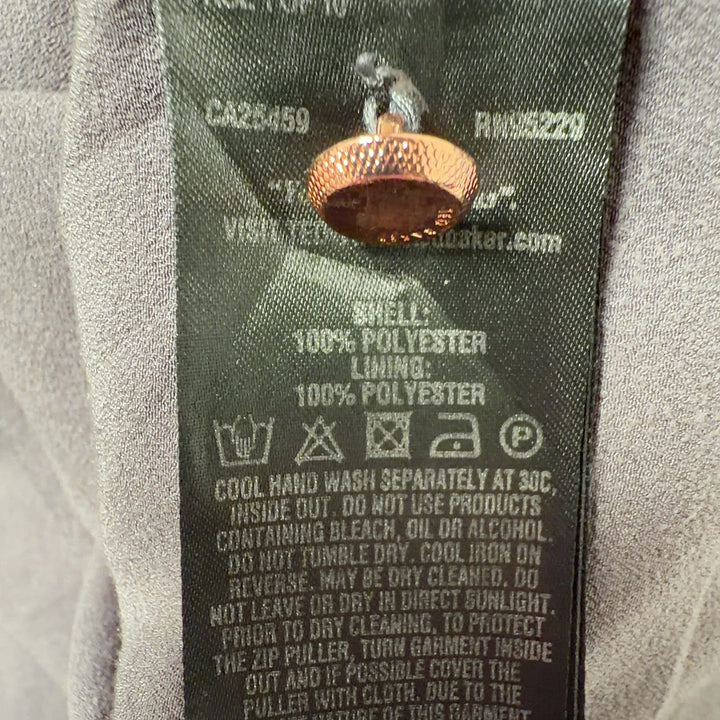 Gray ruffle pocket shift dress with ruffled back detail and patch pocket, back view