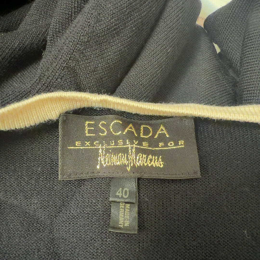 Tag view of black ESCADA wool cardigan with cream trim detailing and three-quarter length sleeves