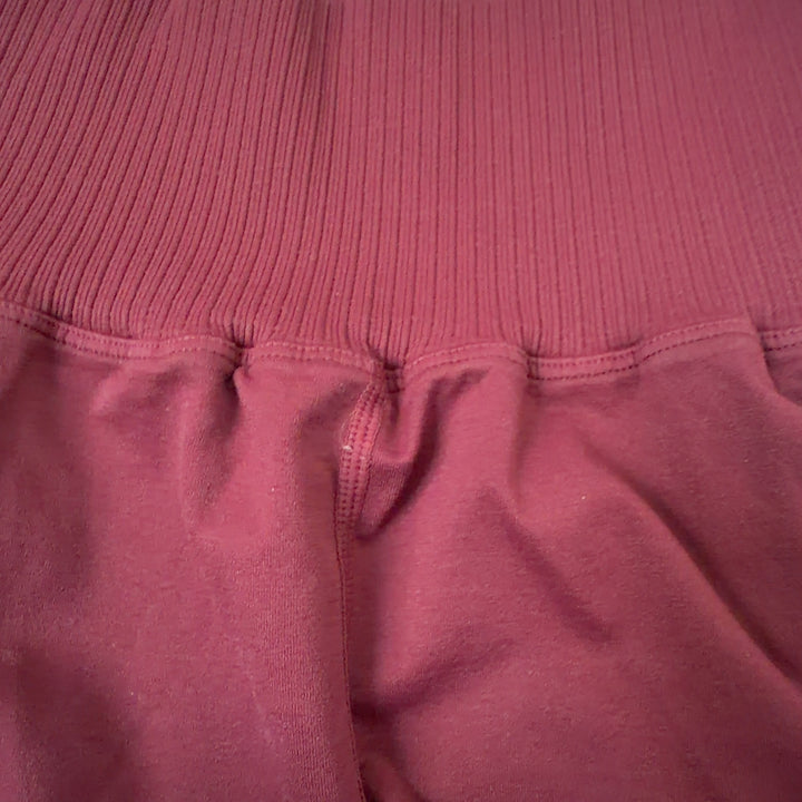 Burgundy ribbed high-waist activewear shorts back view, Free People Movement