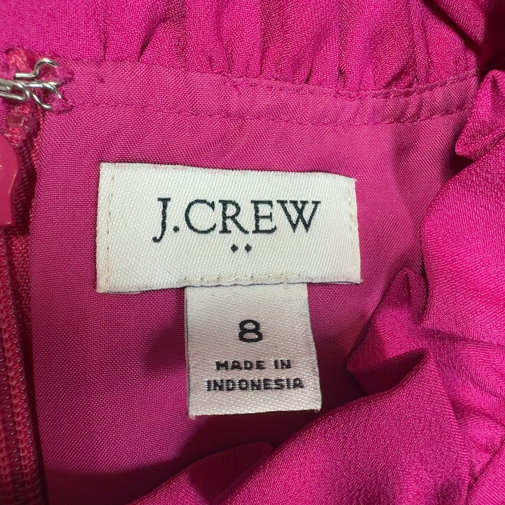 Tag view of pink ruffle neckline long sleeve dress by J.Crew, size M