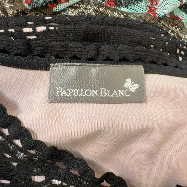 Black lace tank top with ruffle shoulders, back view showing fitted silhouette