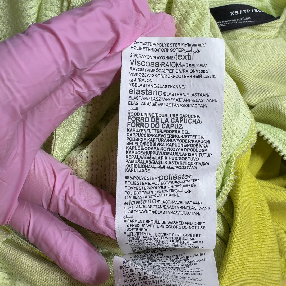 Tag view of yellow Under Armour athletic hoodie jacket with adjustable drawstring hood