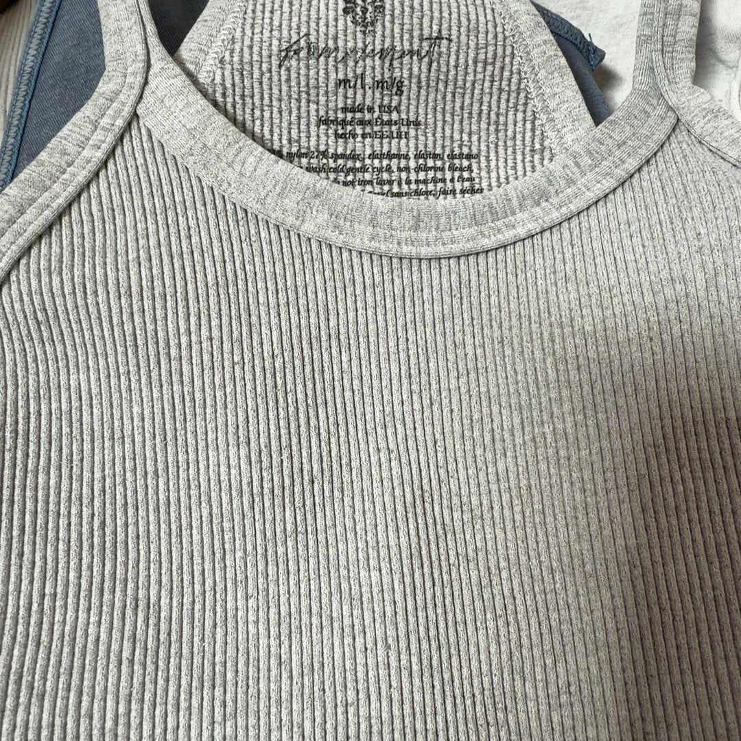 Gray ribbed crop tank top, back view showing fitted silhouette and strap design
