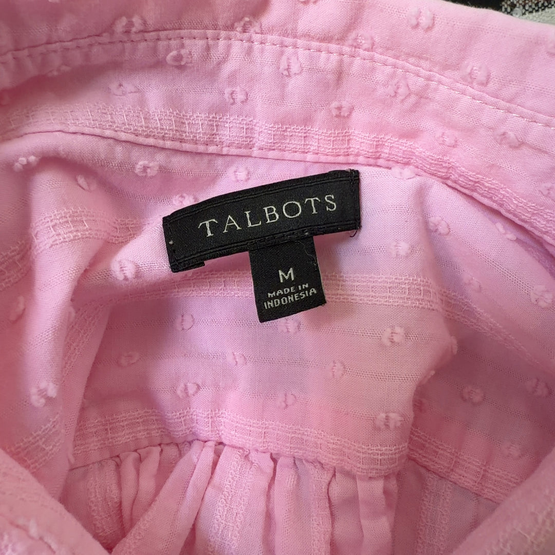 Tag view of pink cotton button-down shirt showing relaxed fit and full-length sleeves
