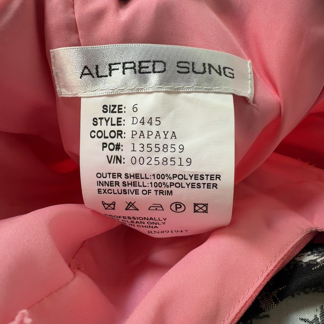 Tag view of pink strapless cocktail dress showing elegant draping and knee-length hem