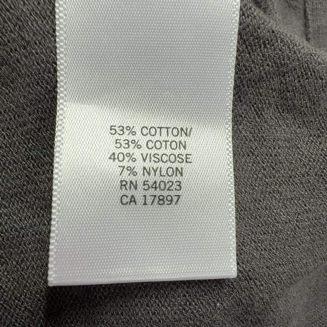 Tag view of gray studded cropped cardigan knit showing stud detailing