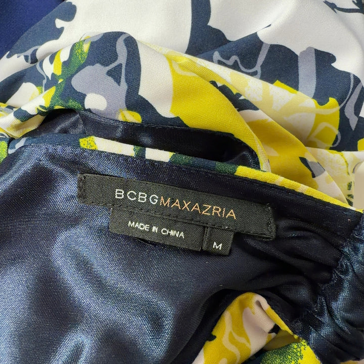 Yellow and navy floral halter neck dress with gathered waist by BCBG MaxAzria, back view