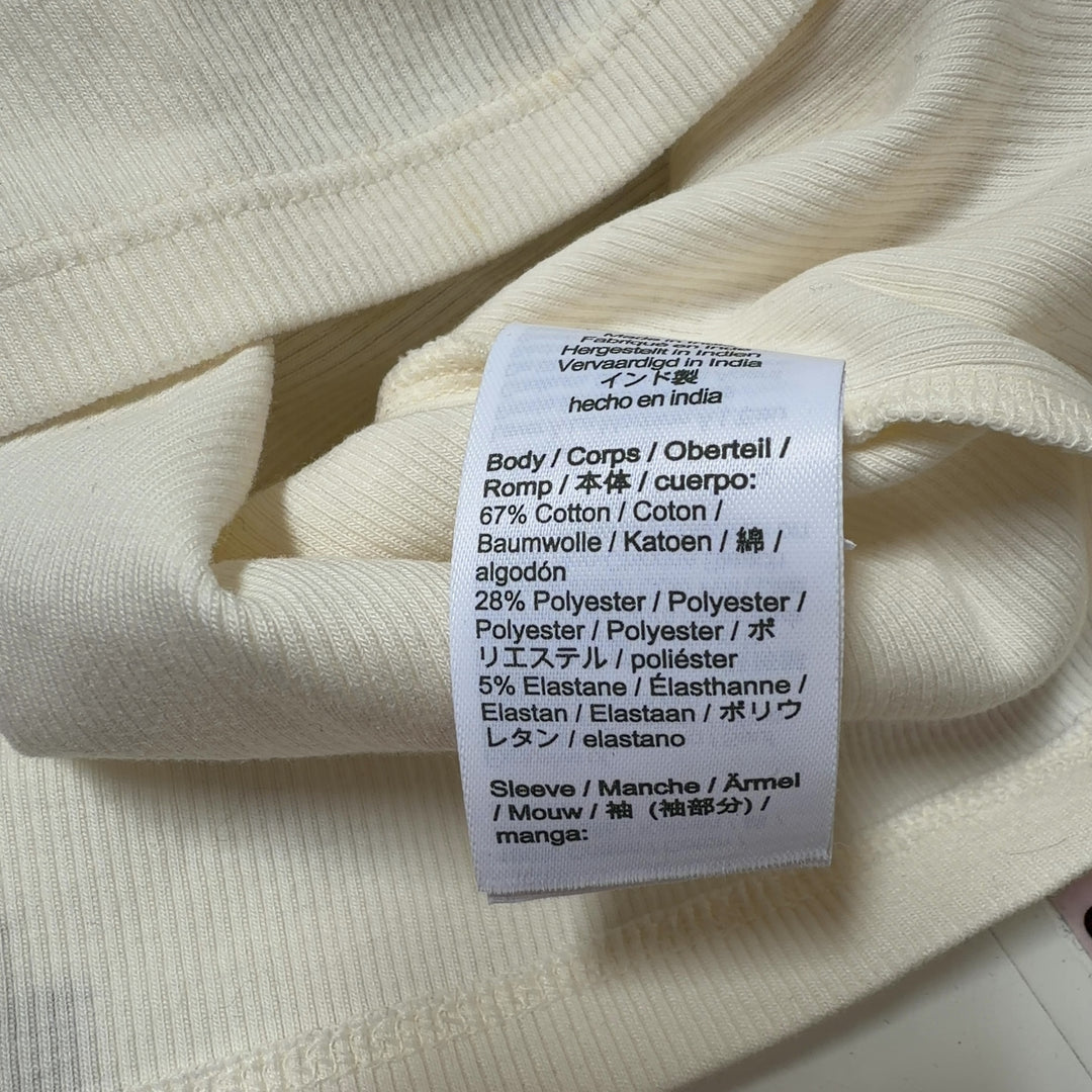 Cream puff sleeve J.Crew top back view on model, displaying fitted silhouette and puffed sleeve details