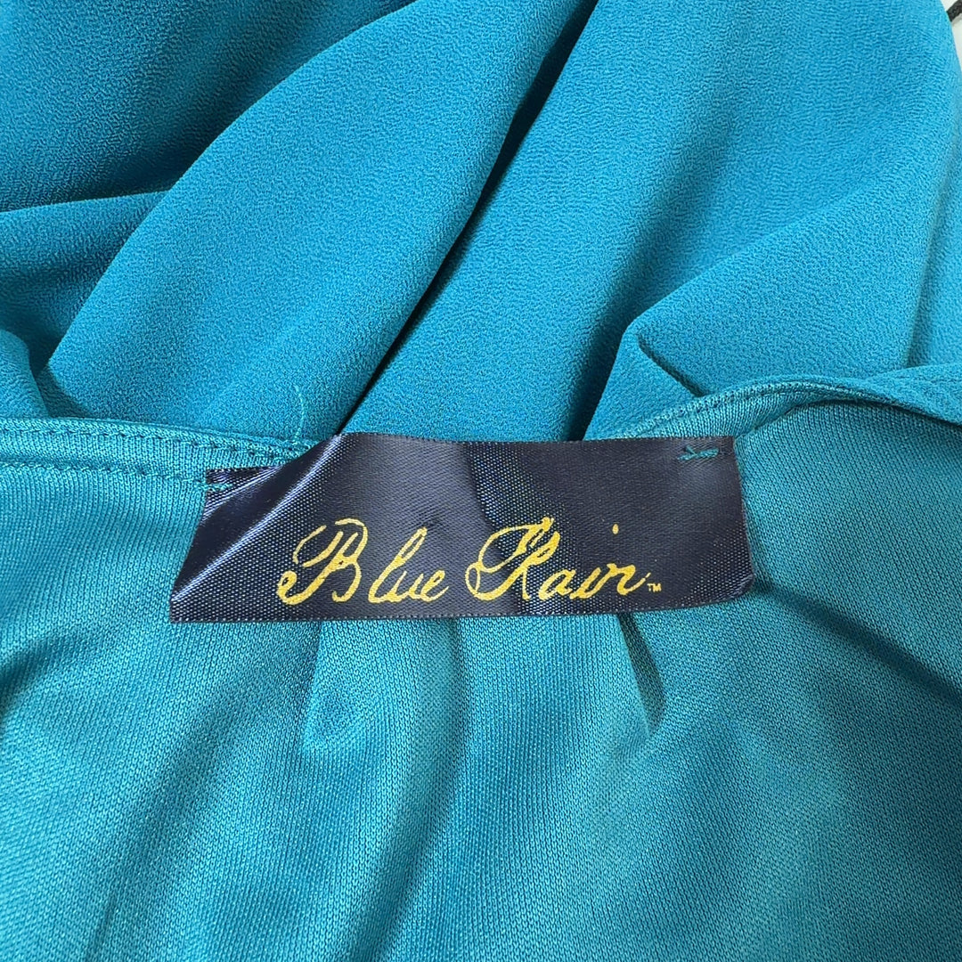 Teal flutter sleeve tie waist dress back view, showing elegant draping and design