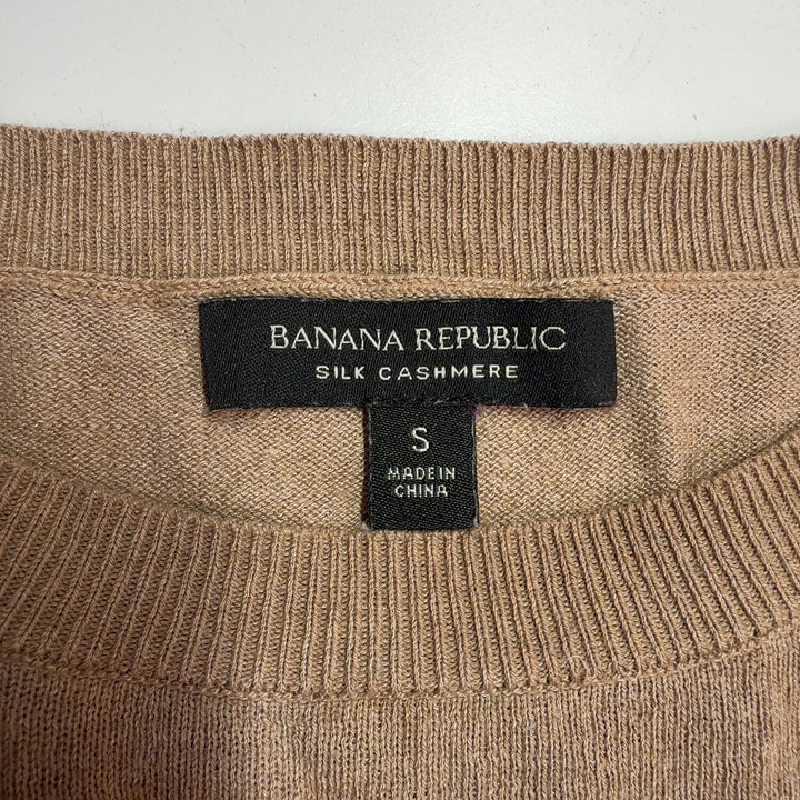 Beige cashmere silk crew neck sweater back view on model