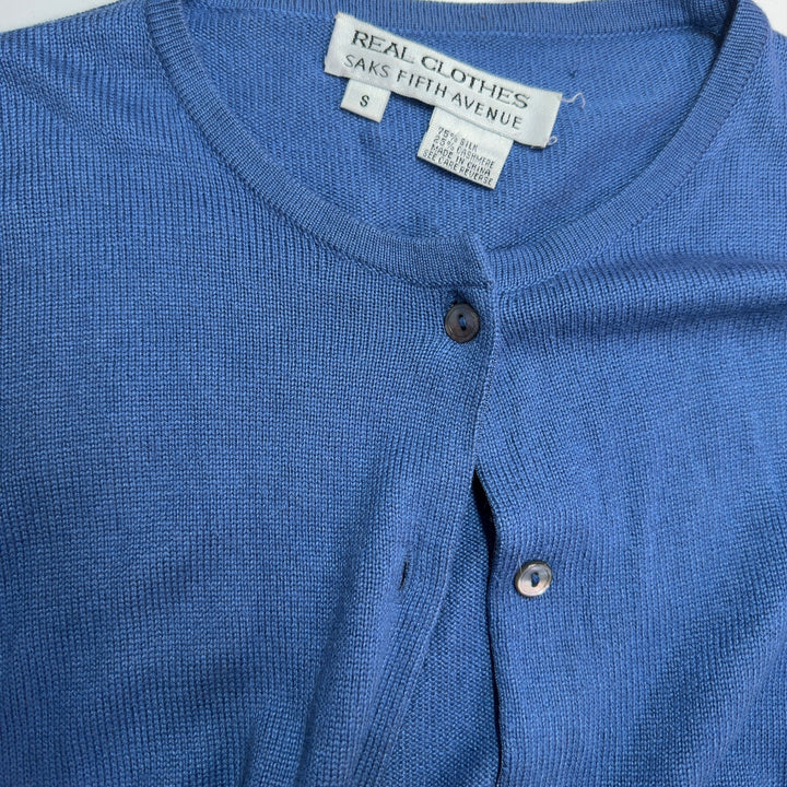 Blue cashmere silk cardigan back view showing fitted silhouette and long sleeves