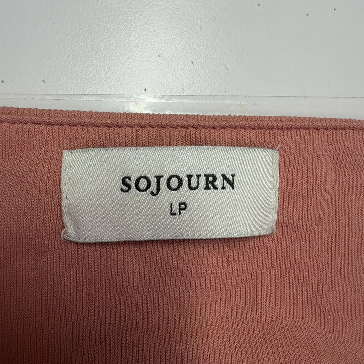 Peach puff sleeve top with square neckline and three-quarter sleeves, back view