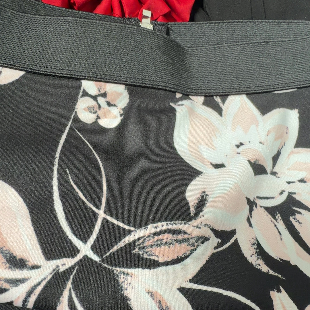 Black pencil skirt with white and pink floral botanical print, back view