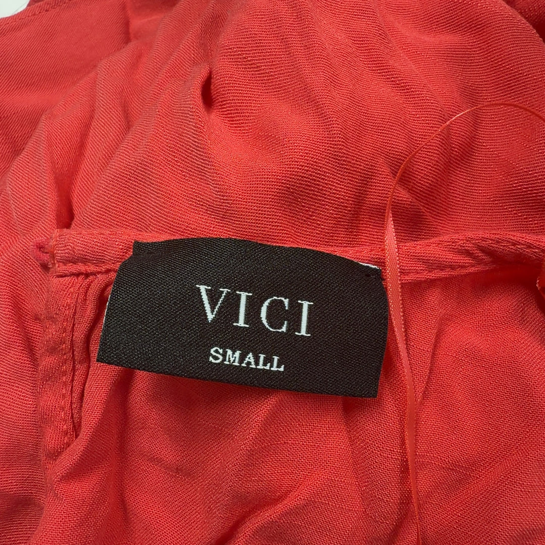 Red rayon bubble hem romper with draped back detail, back view
