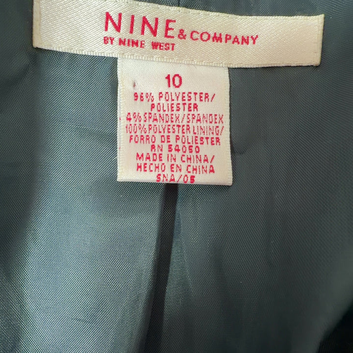 Nine & Co. teal floral blazer jacket back view, showing tailored silhouette and floral pattern