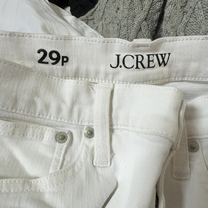 White cropped denim jeans by J.Crew, back view displaying classic denim construction and flattering fit