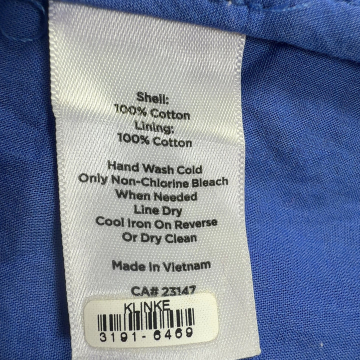 Blue eyelet cotton top with puff sleeves, back view