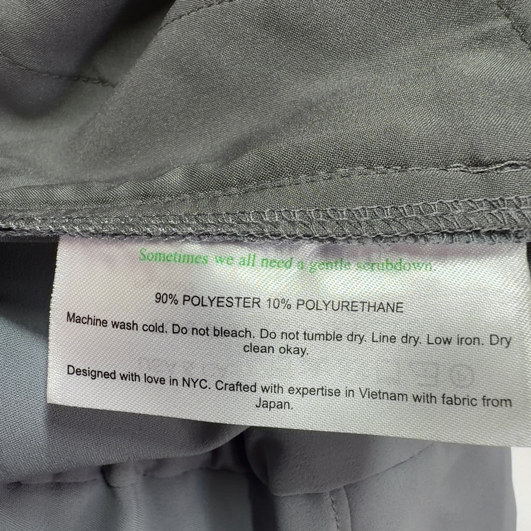 Tag view of gray tailored dress pants with elastic waistband from MM. LaFleur, size S