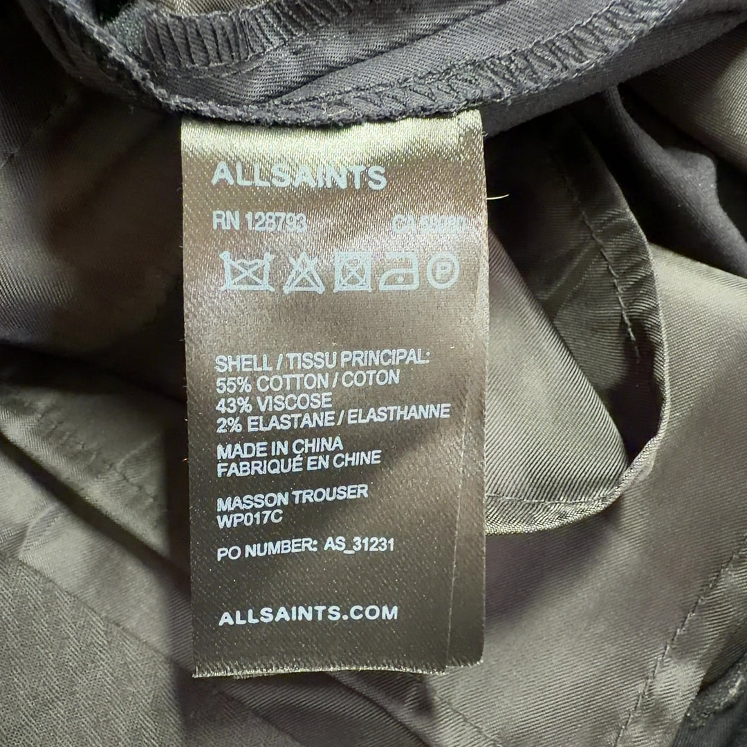 Black cropped dress pants from Allsaints, back view displaying the tailored fit and refined construction of the premium fabric