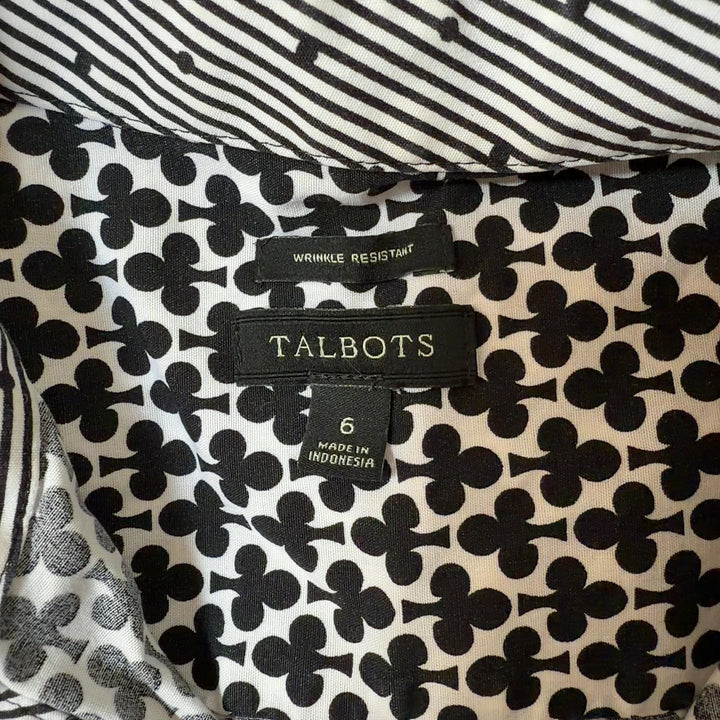 Black and white geometric print button-up shirt, back view showing full length and fit