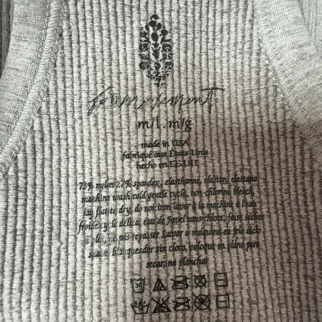Gray ribbed crop tank top, back view showing fitted silhouette and strap design