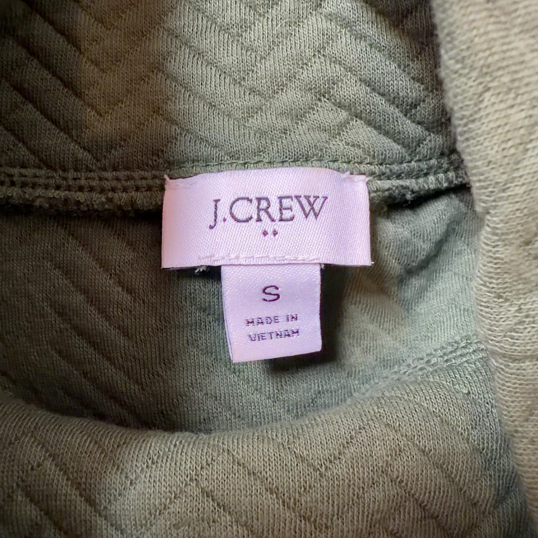 J.Crew green turtleneck pullover knit sweater back view showing button accents and cropped length