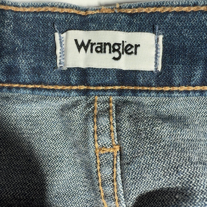 Tag view of blue Wrangler flare jeans showing classic denim construction and flared leg silhouette