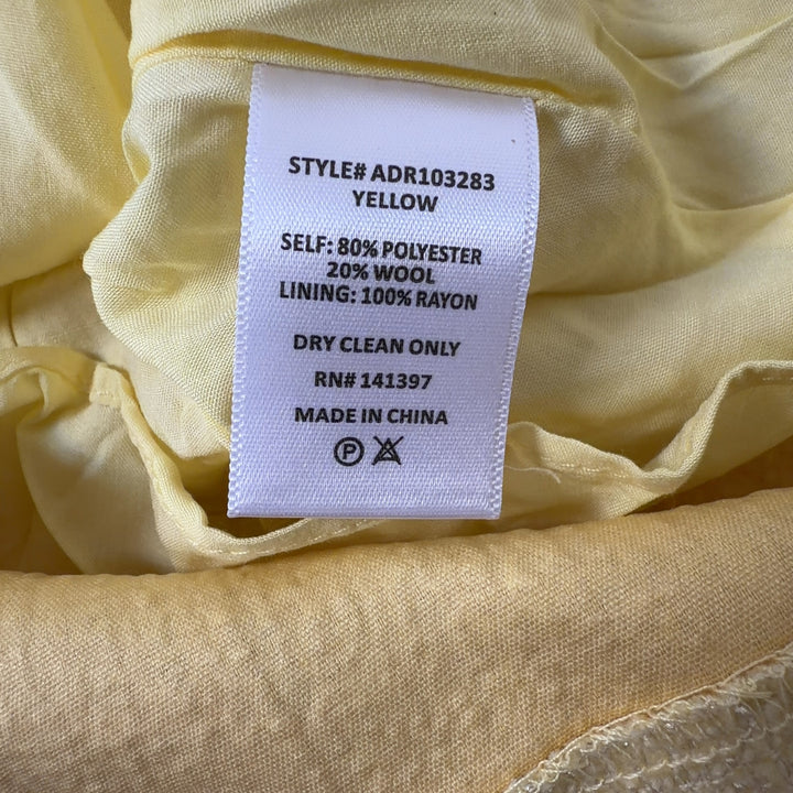 Yellow square neck sleeveless dress with patch pockets, back view