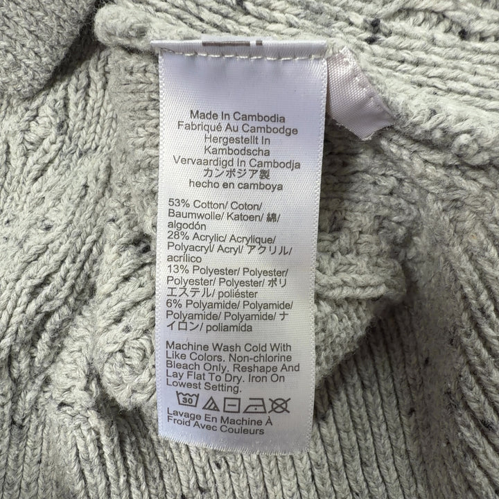 Tag view of cream cable knit pullover sweater showing textured diamond knit pattern and cropped silhouette