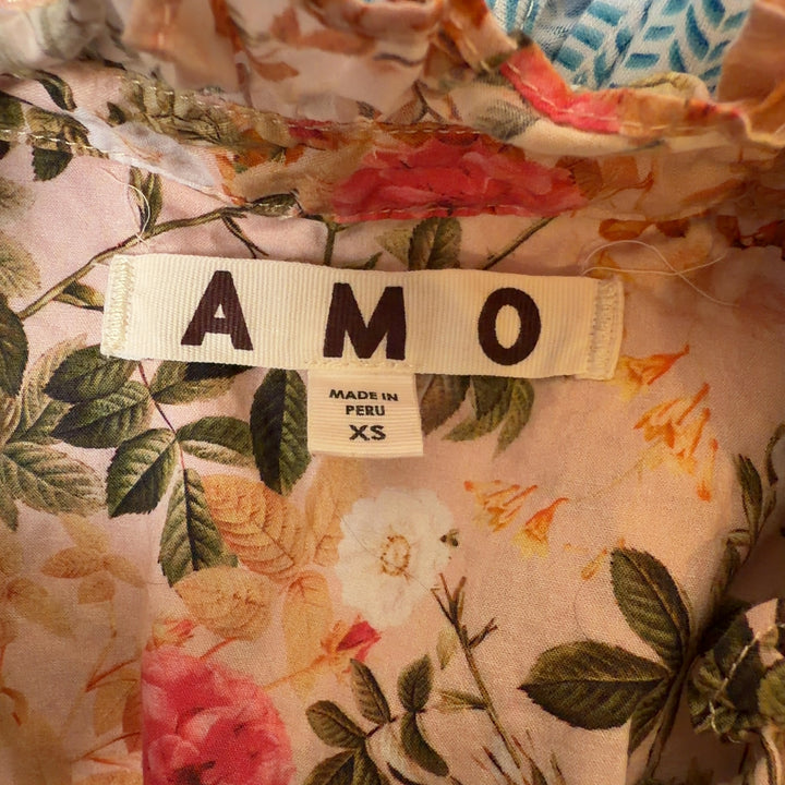Cream floral Pima cotton button-up top by Amo, back view showing relaxed fit and long sleeves
