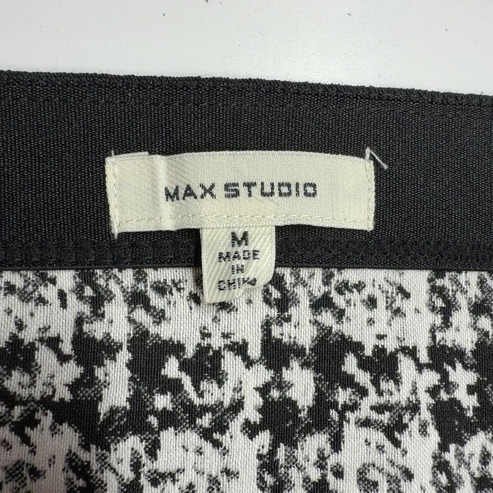 Black and white houndstooth tweed pencil skirt back view, showing fitted silhouette by Max Studio