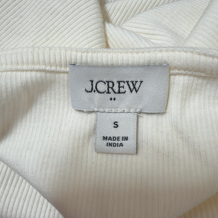Cream puff sleeve J.Crew top back view on model, displaying fitted silhouette and puffed sleeve details