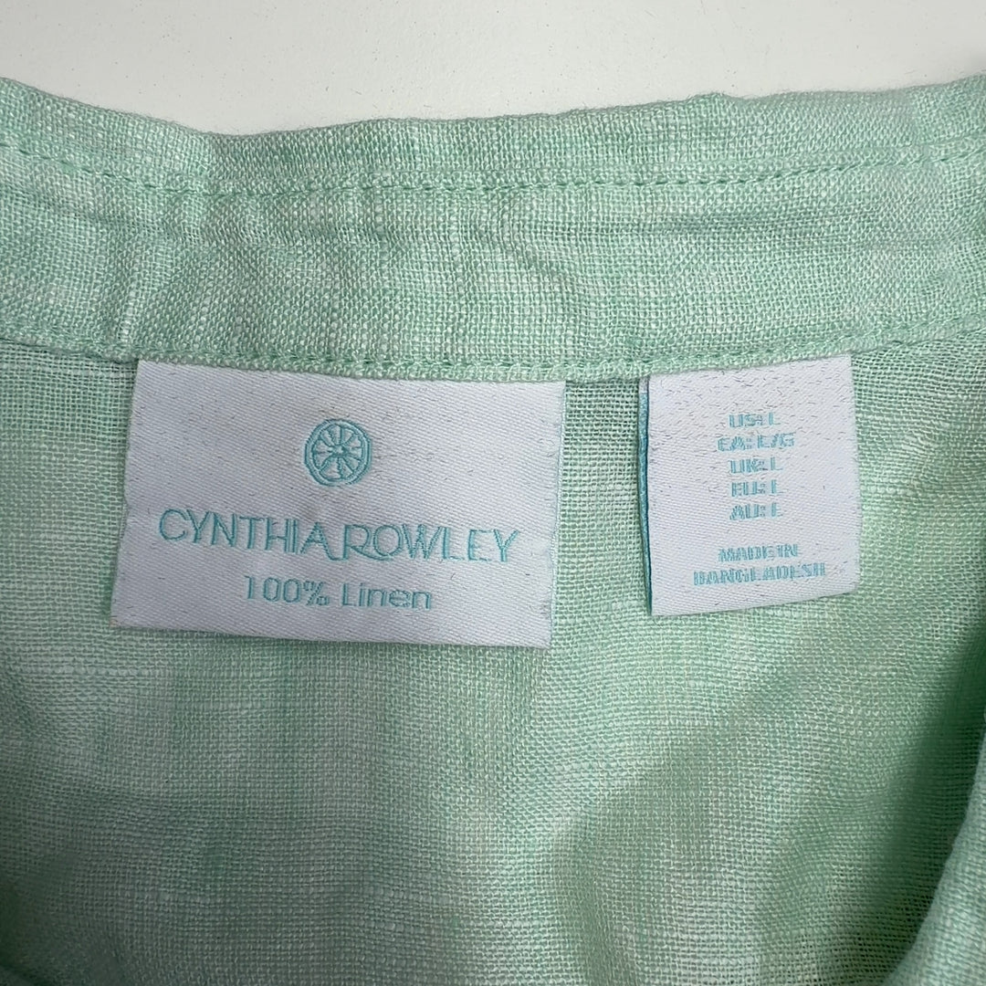 Mint green linen button-up crop shirt by Cynthia Rowley, back view displaying relaxed fit and full-length sleeves