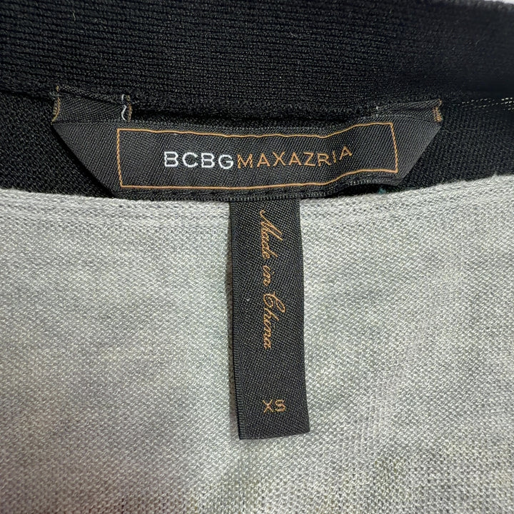 Tag view of gray and black BCBG MaxAzria cardigan showing relaxed fit and draping