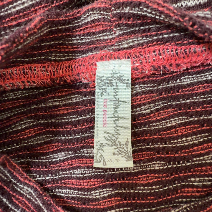 Rust heathered textured crop top knit with short sleeves, back view