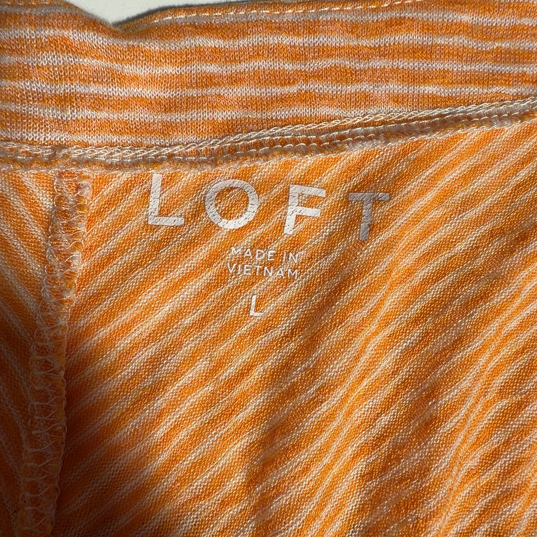 Gold striped V-neck short sleeve top from LOFT, size L, back view displaying the relaxed silhouette and striped pattern