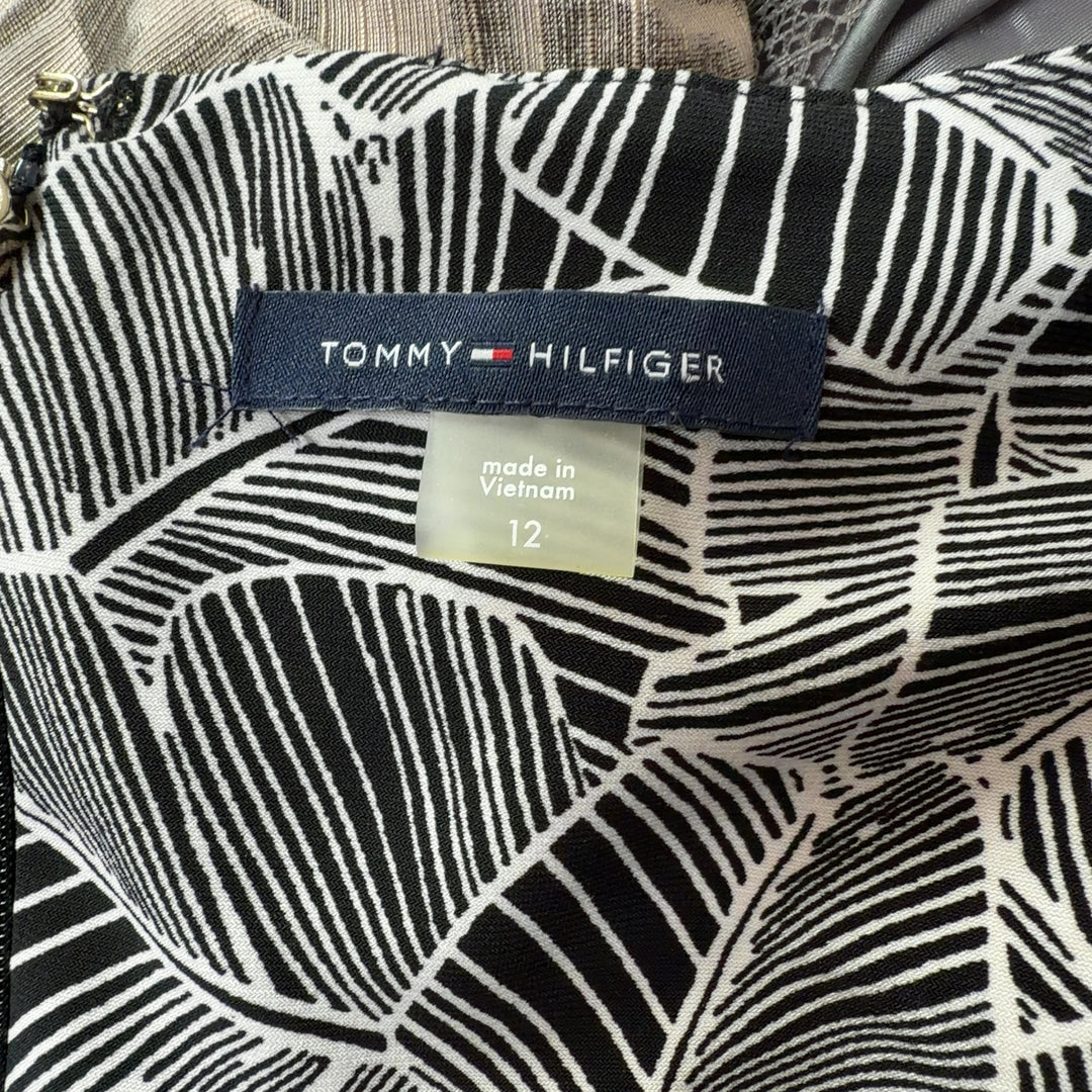 Tommy Hilfiger gray geometric print shift dress with bell sleeves, back view on model