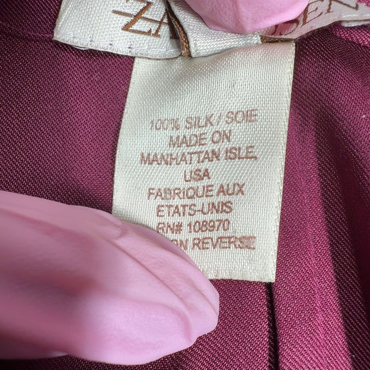 Burgundy silk midi dress with high-low hemline and overlay detail, back view