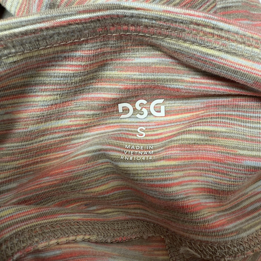 Tag view of multicolor striped high-waist yoga leggings by DSG, displaying the striped pattern and form-fitting silhouette