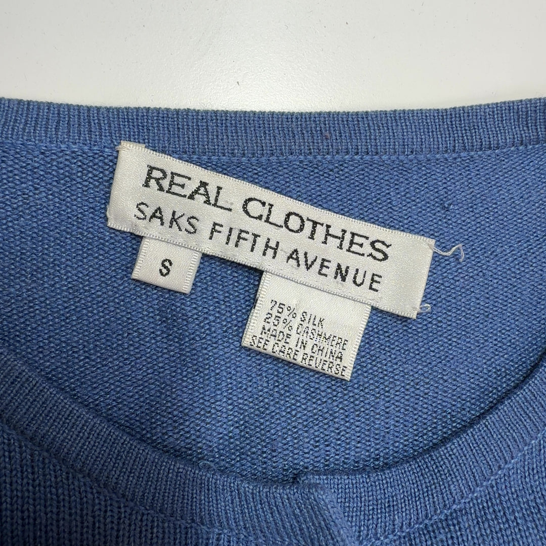 Blue cashmere silk cardigan back view showing fitted silhouette and long sleeves
