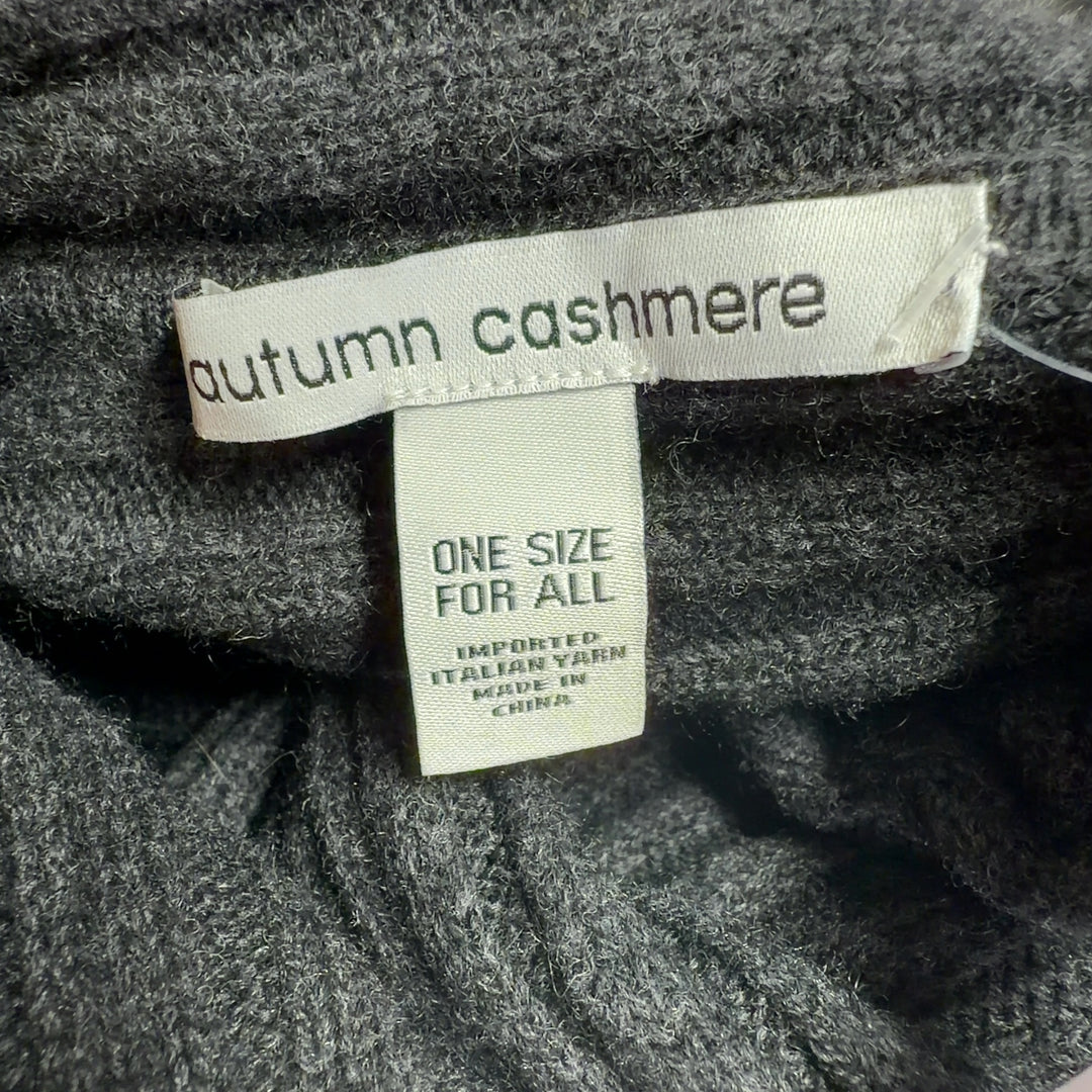 Black cashmere ribbed wrap poncho with asymmetrical hemline, back view with turtleneck detail