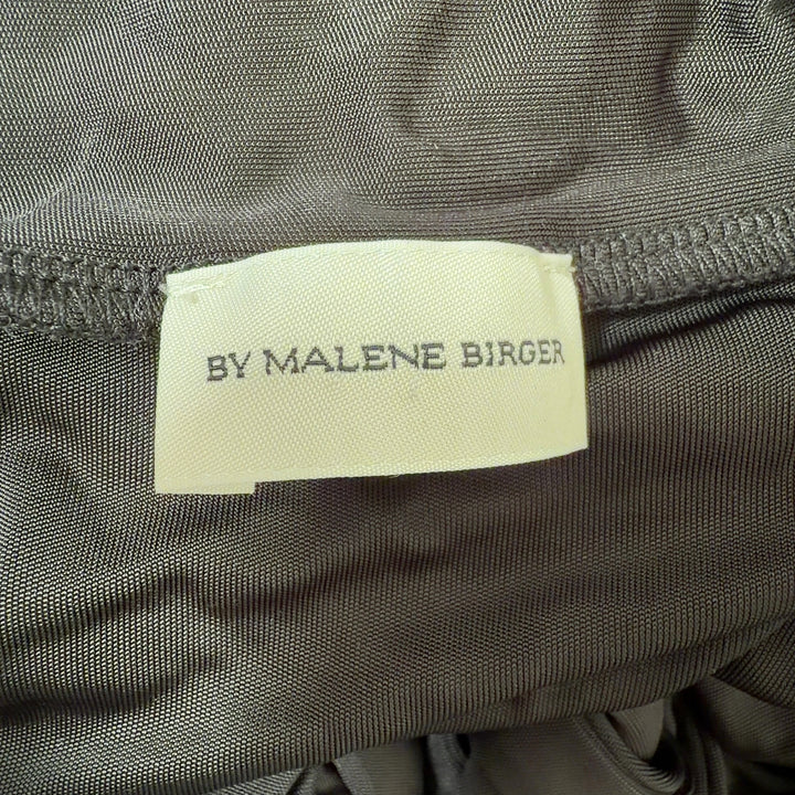 Black wrap midi skirt with tie detail and A-line silhouette by MB by Malene Birger, back view
