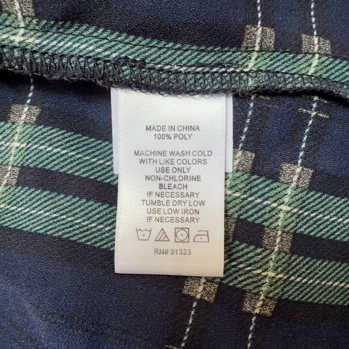 Navy and green plaid tie-neck blouse with long sleeves, back view