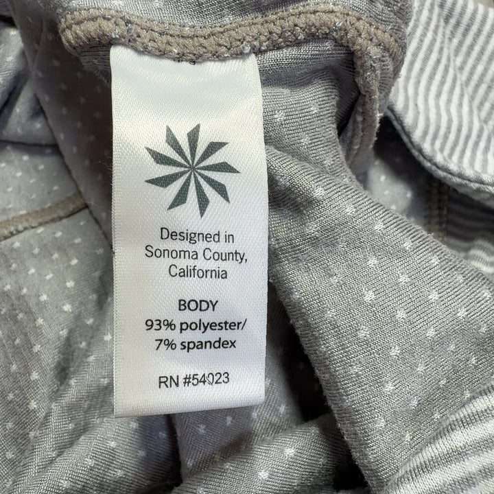 Gray and white striped Athleta hooded pullover back view showing fitted silhouette