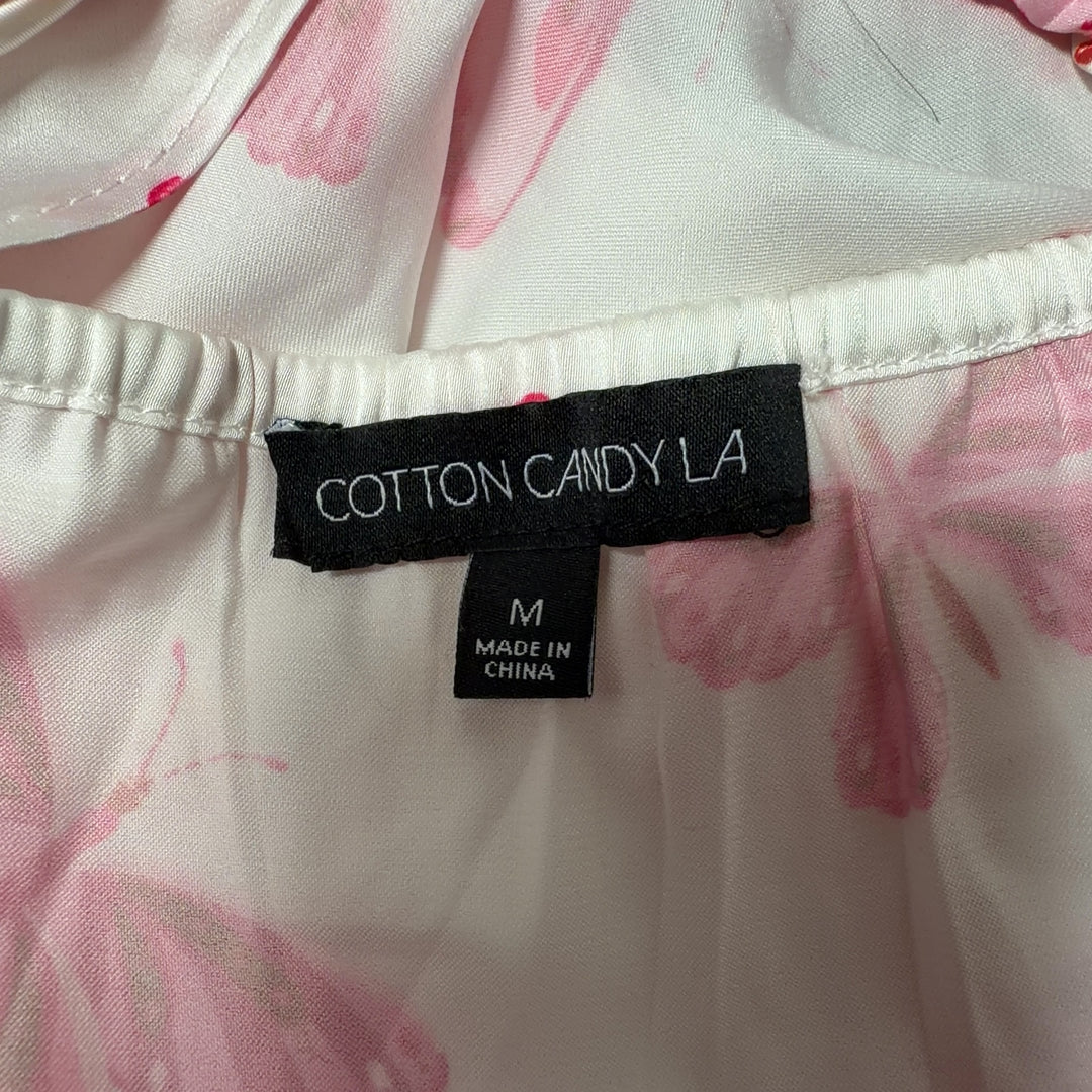 Pink butterfly print crop top with tie-back closure detail, back view