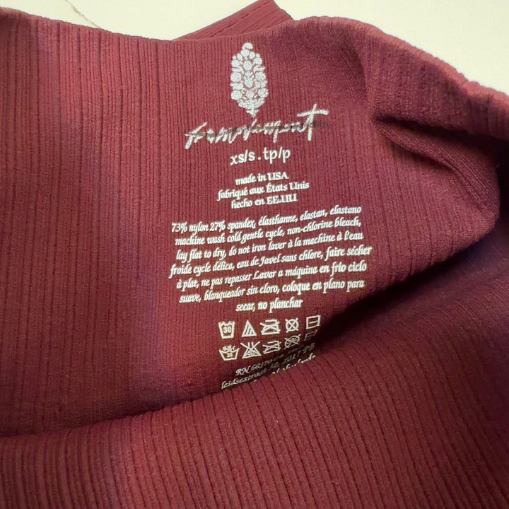Burgundy ribbed high-waist activewear shorts back view, Free People Movement