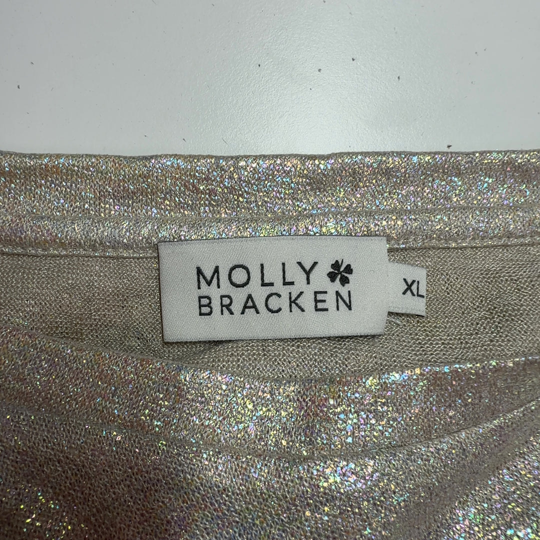 Gold metallic short sleeve top back view, showing relaxed fit and shimmer finish
