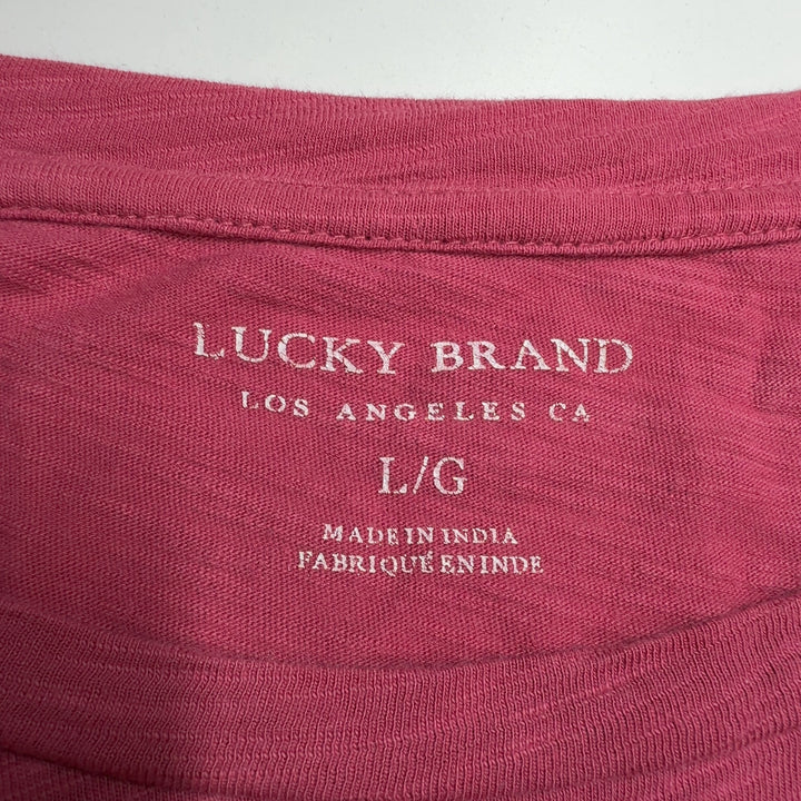 Burgundy bird print tee back view, showing scattered white bird design