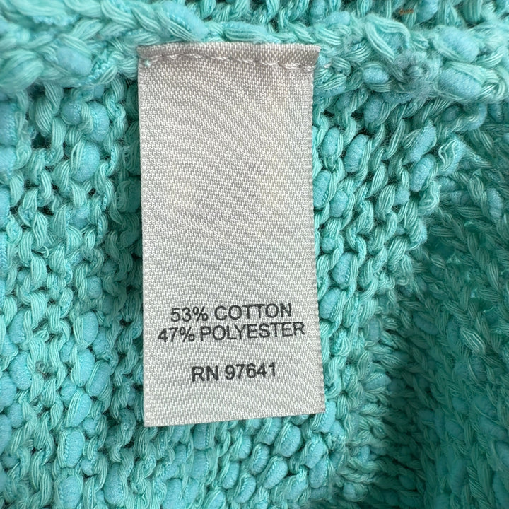 Tag view of mint green hooded knit sweater showing relaxed silhouette and rolled cuffs